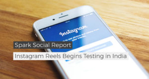 spark social report instagram reels begins testing in india title with phone in the background