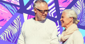 Senior couple on a walk outside to promote healthy lifestyle.