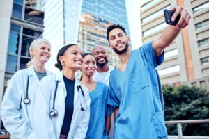 article banner featuring group of doctors taking a selfie