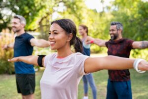 photo of a group of people engaging in wellness activity