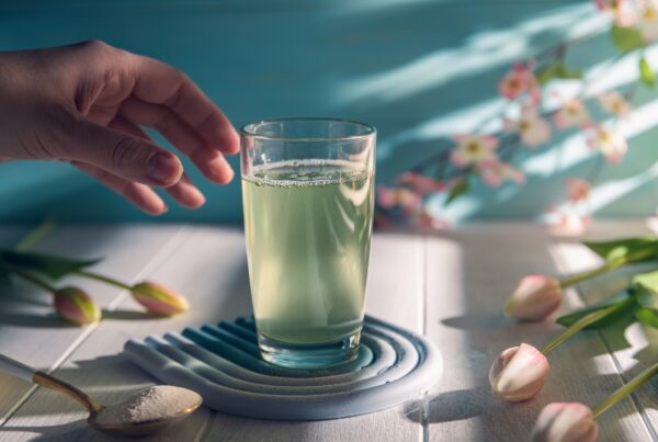 image of hand reaching for healthy beverage image for blog article From Performance to Purpose: Marketing Functional Beverages to Women