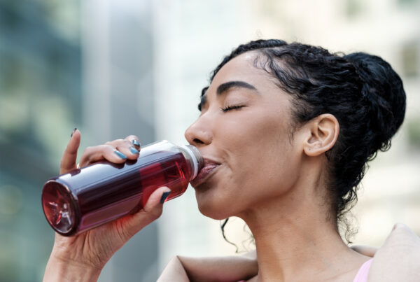 Functional Electrolyte Market Trends and Growth article title banner featuring a women drinking a healthy beverage